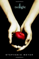 Two pale hands cradling a single red apple against a black background